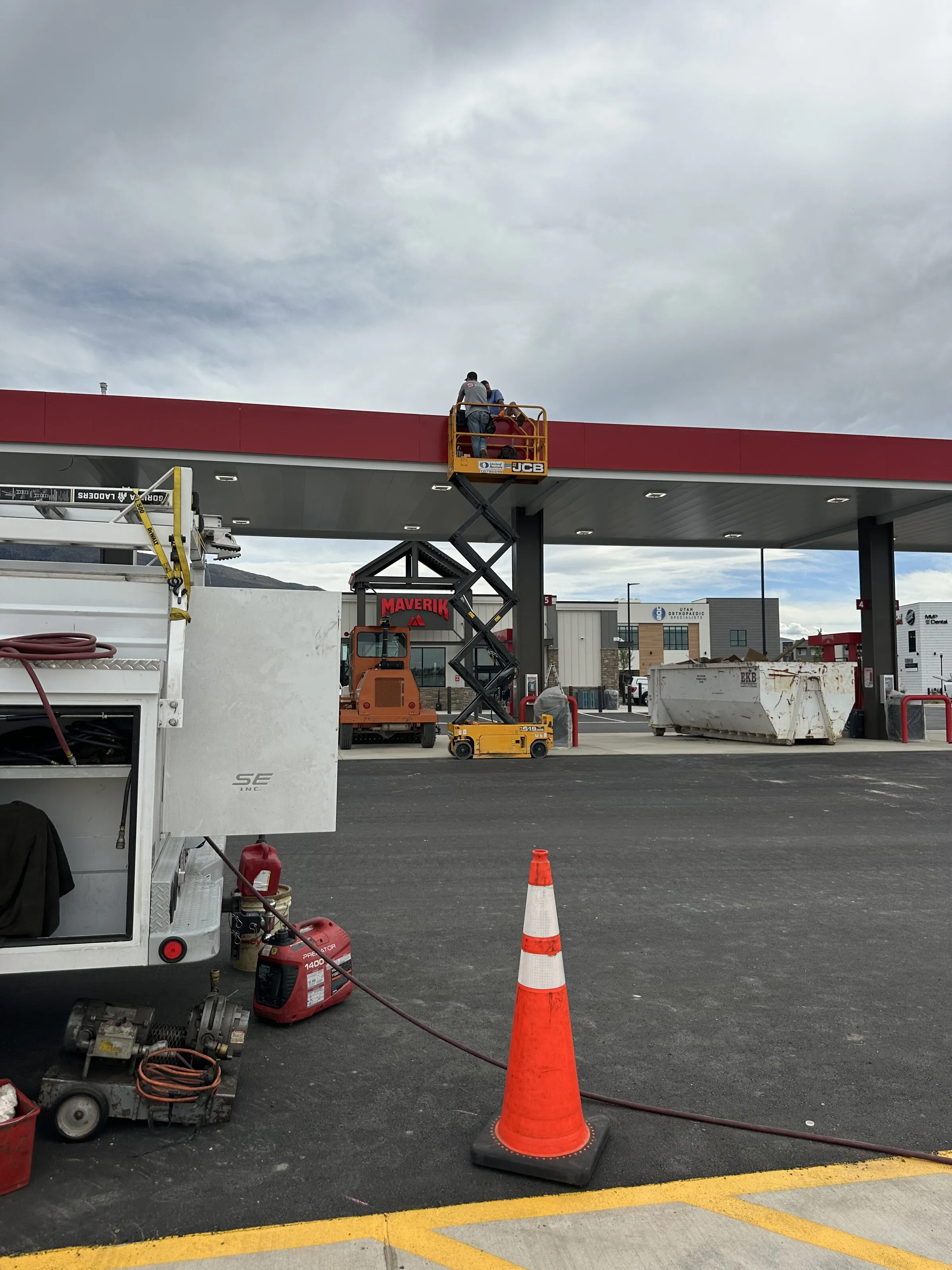 A Precision Testing Technologies field technician at a fuel-site compliance testing job in the Intermountain West.